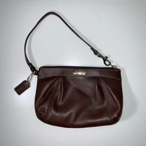 coach wristlet with beautiful pink interior